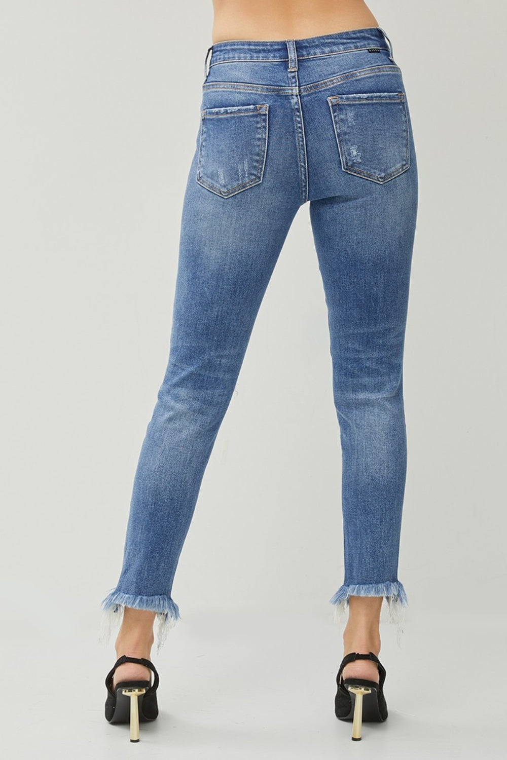 Risen Distressed Frayed Hem Slim Jeans