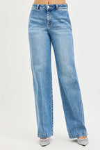 Women's medium-wash straight jeans with relaxed fit, button fly, belt loops