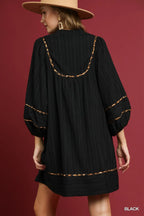 Textured Babydoll Dress with Leopard Trim Trendy & Playful Style