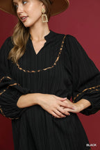 Textured Babydoll Dress with Leopard Trim Trendy & Playful Style