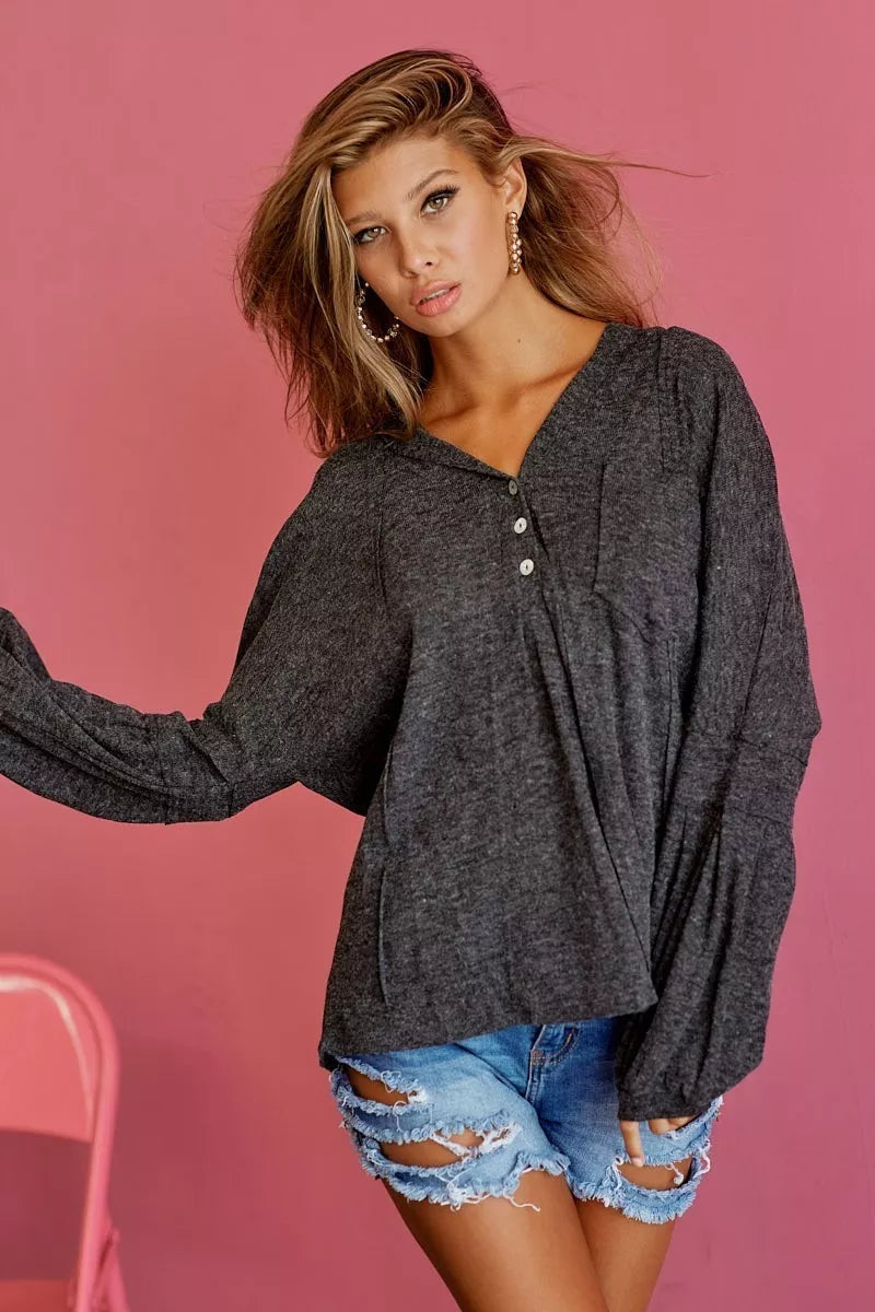 Charcoal textured knit hoodie with hood and buttoned placket, long sleeves