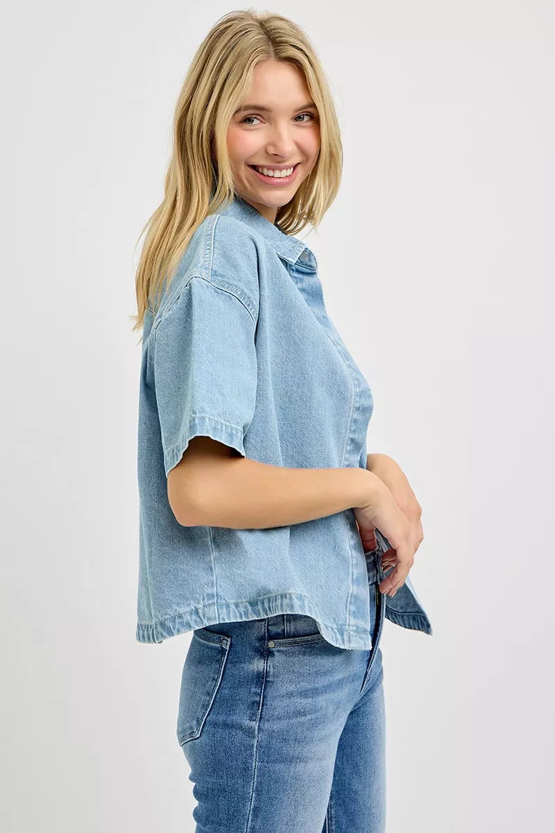 Light blue denim oversized cropped half-sleeve shirt, side view with button placket