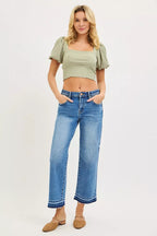 Light blue cropped boyfriend jeans, cuffed hem, relaxed fit, front pockets