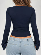 Navy lace-trim V-neck long-sleeve tee, back view with ruched waist