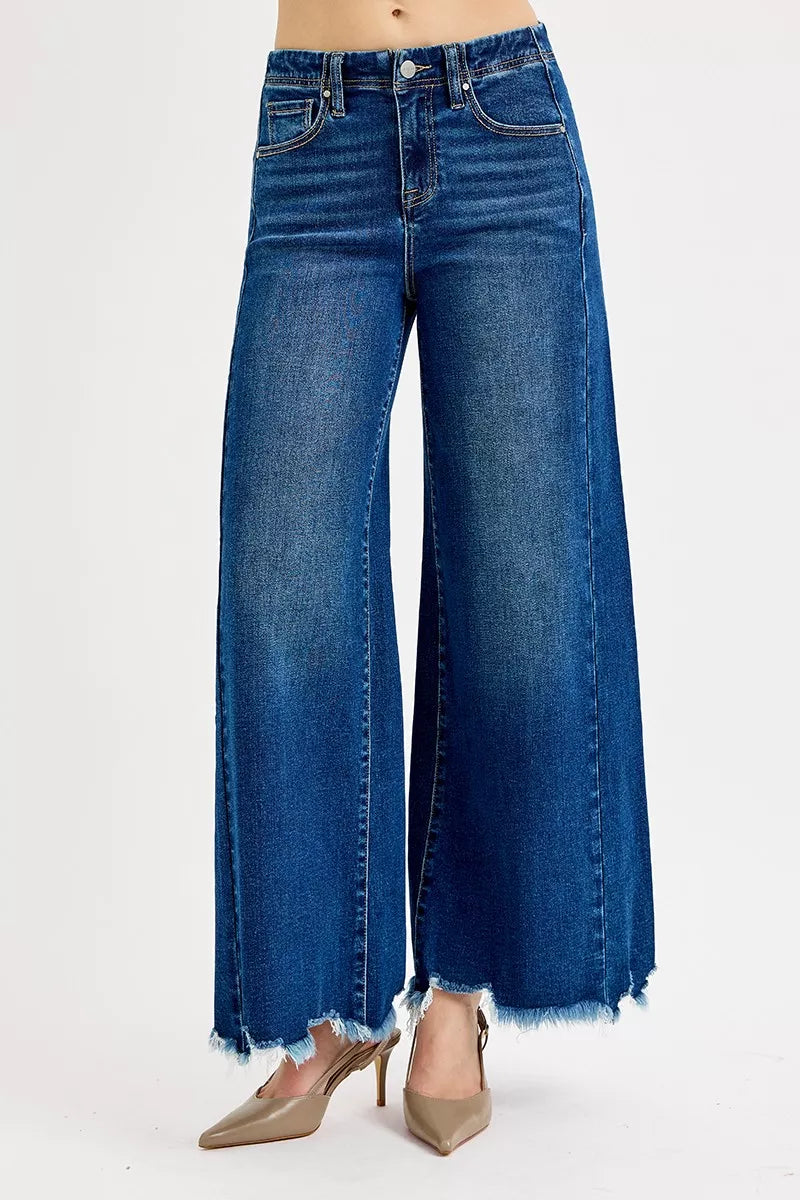Women’s high-rise wide-leg jeans in dark blue wash denim, frayed ankle hems
