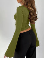 Avocado green lace-trim V-neck long-sleeve tee with flared sleeves and fitted waist.