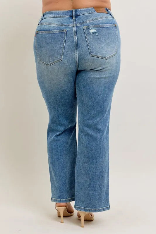 Medium blue high-waist straight jeans, back view with back pockets and faded wash