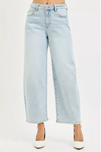 Light wash high-rise crop barrel jeans with button fly and wide leg