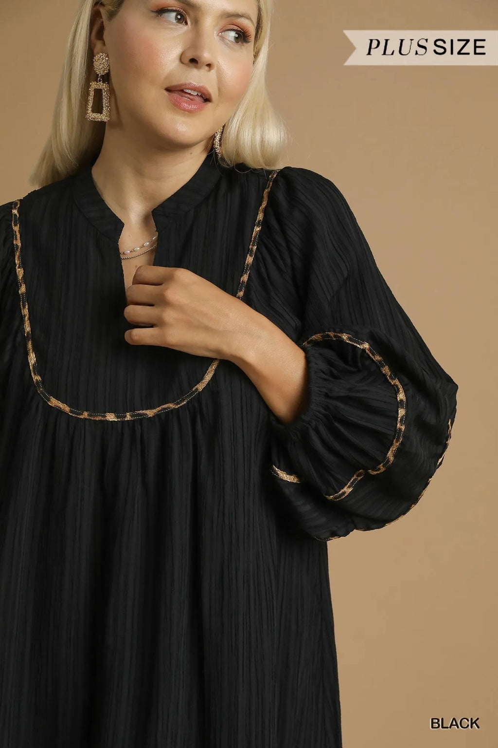 Textured Babydoll Dress with Leopard Trim Trendy & Playful Style
