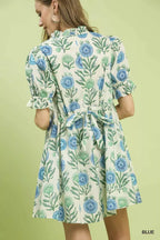 Blue floral babydoll dress, puff sleeves and pleated back yoke with bow tie
