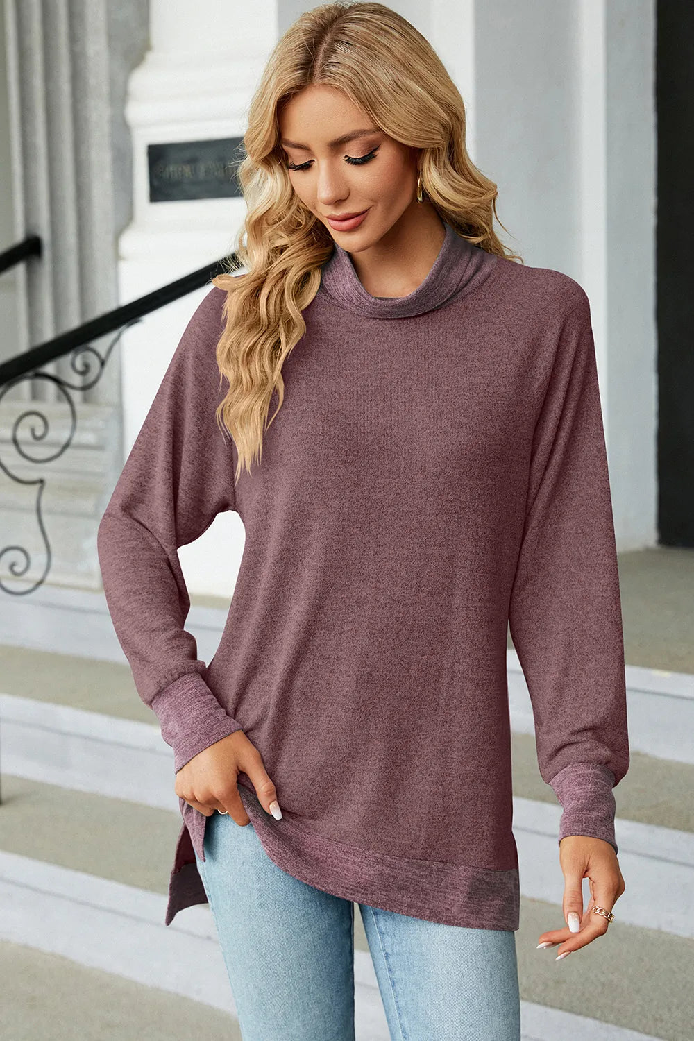 Mock-neck long-sleeve slit tee, mauve heather, relaxed fit with curved hem and side slit.