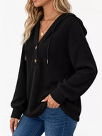 Black waffle-knit button hoodie with hood drawstrings and long sleeves