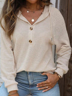 Cream waffle-knit button hoodie with hood and kangaroo-style front pocket