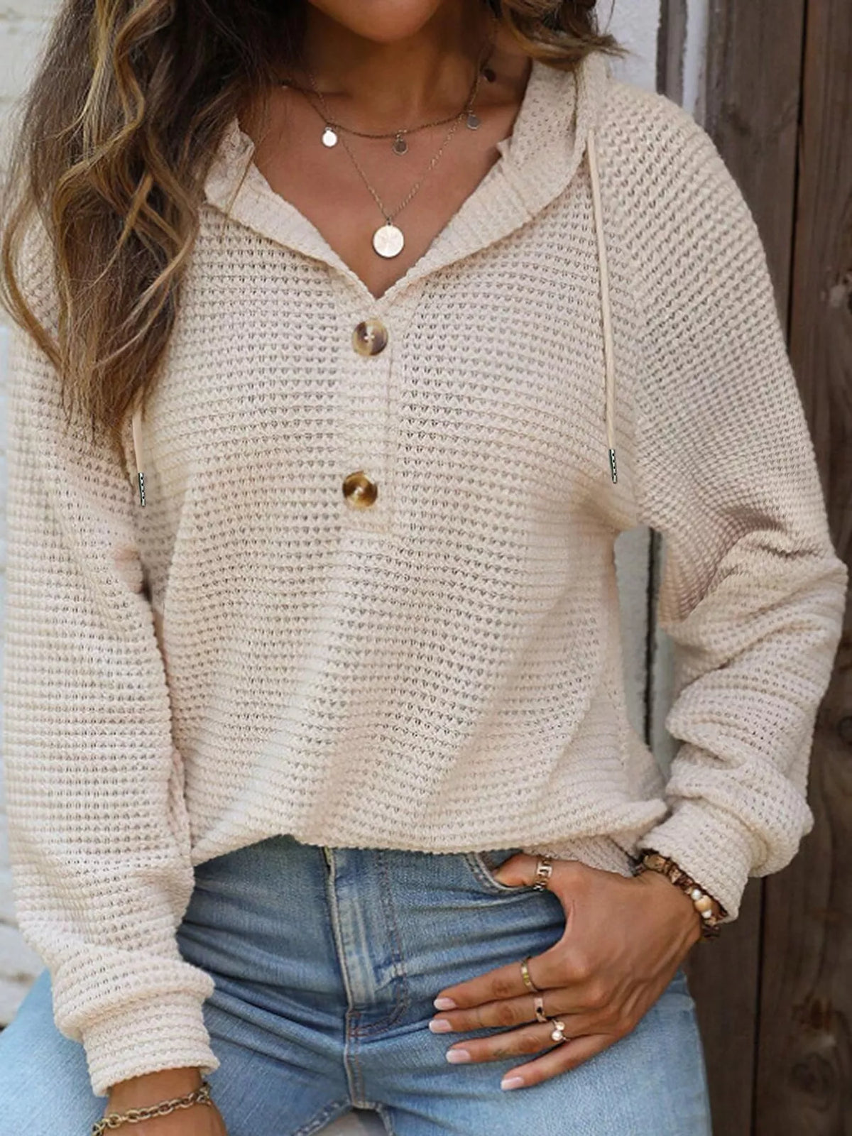 Cream waffle-knit button hoodie with hood and kangaroo-style front pocket