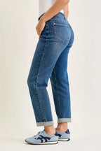 Women’s mid-rise boyfriend jeans with back pocket distressing and cuffed hem