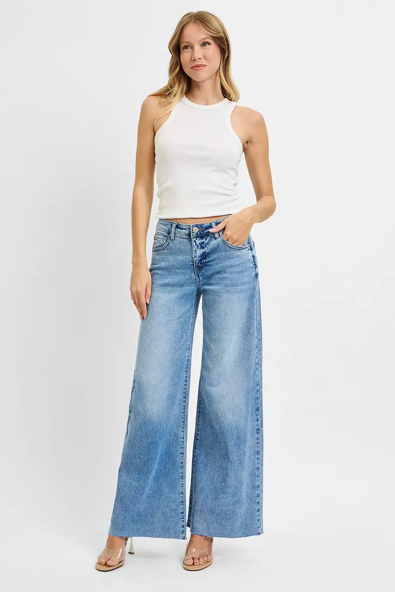 Light blue high-rise wide-leg denim jeans with front pockets and ankle-length cuffs