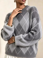 Fuzzy argyle knit sweater in heather gray with white diamond pattern and ribbed cuffs