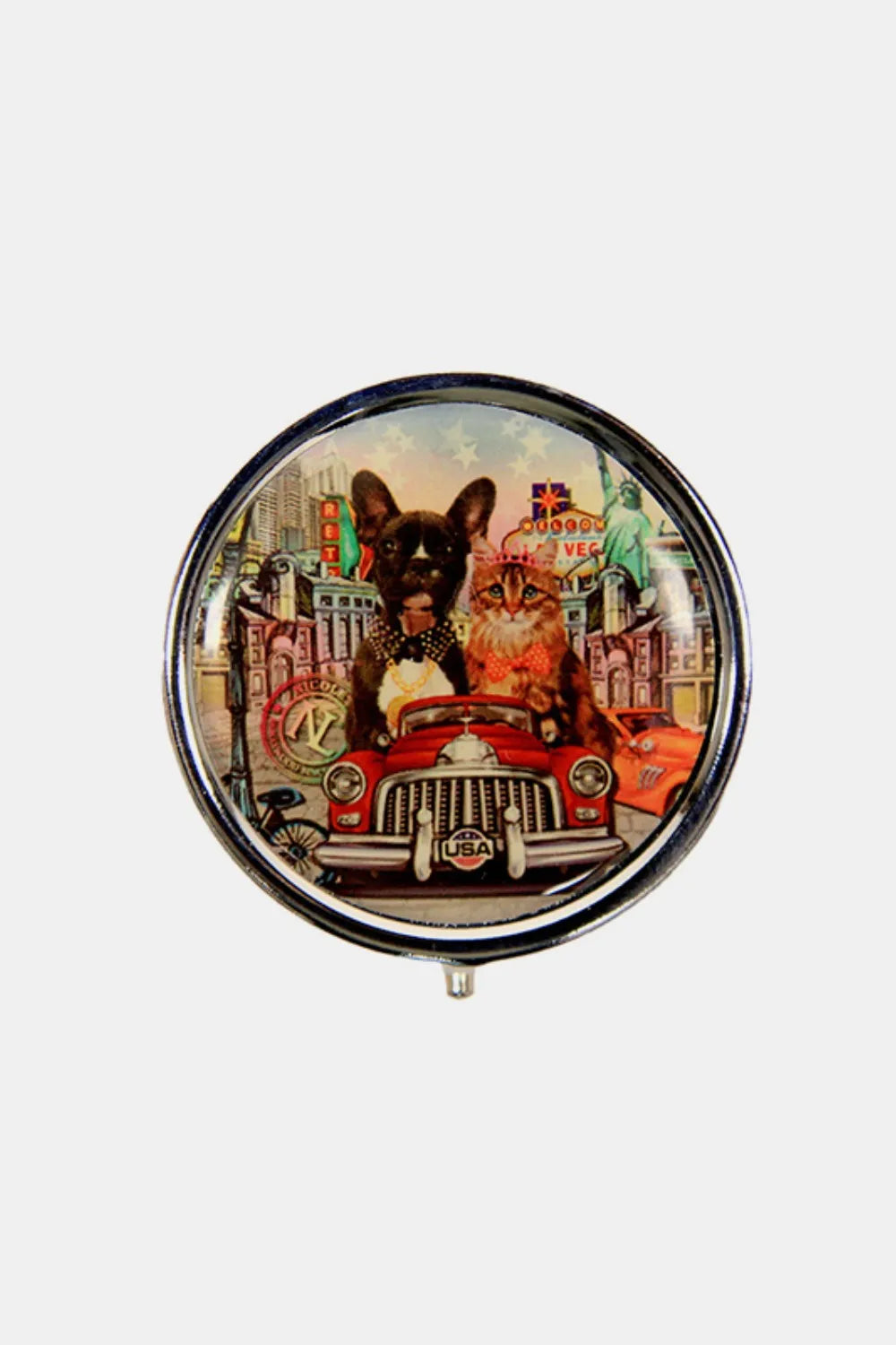 Silver round 3-compartment pill case with dog-and-car artwork on lid