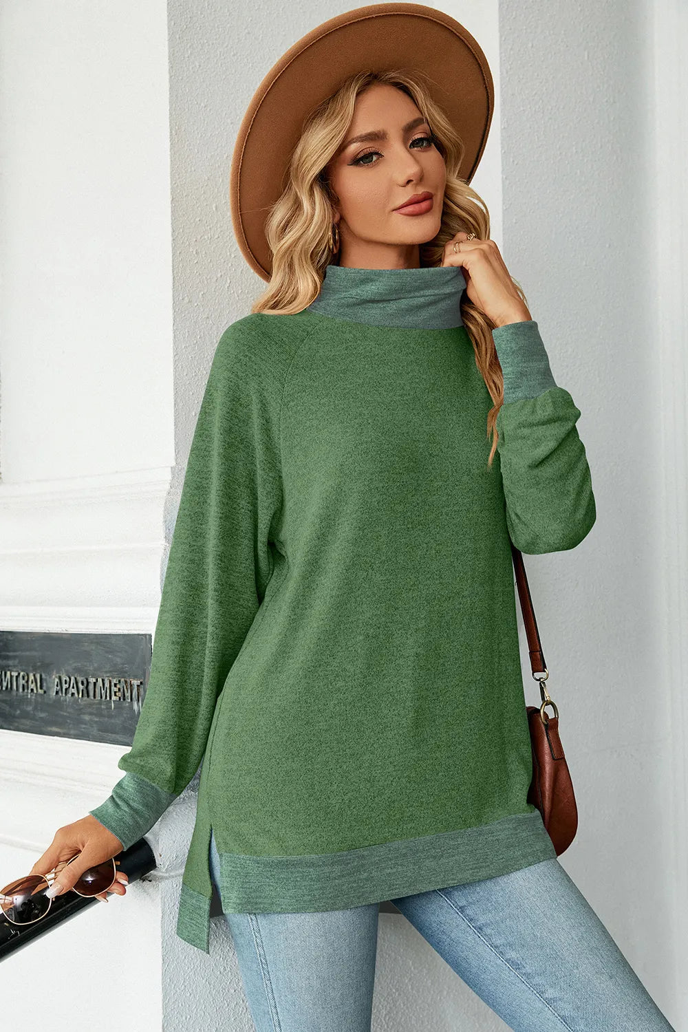 Green mock neck long sleeve tee with slit hem and contrast hem band