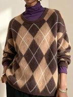 Fuzzy argyle knit sweater, brown and beige diamond pattern with white lines; crew neck.