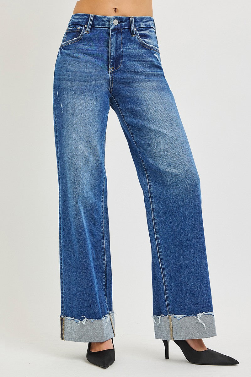 High-rise wide-leg jeans, medium blue wash, button fly and cuffed frayed hem