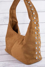 Brown studded shoulder bag with open top and silver grommet trim