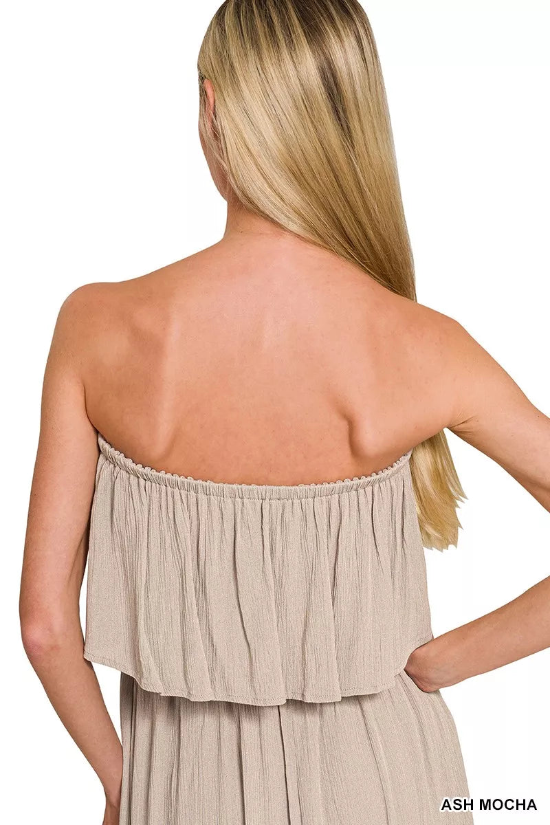 Back of strapless ash mocha crinkle maxi dress with gathered ruffle trim and tiered skirt