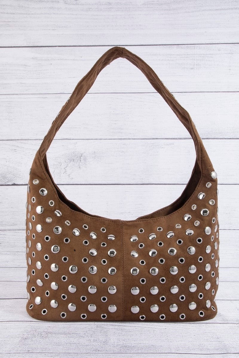 Brown studded shoulder bag with top handles and metal grommet pattern