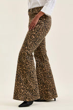Leopard print flare jeans, high-rise fit, wide flared legs.