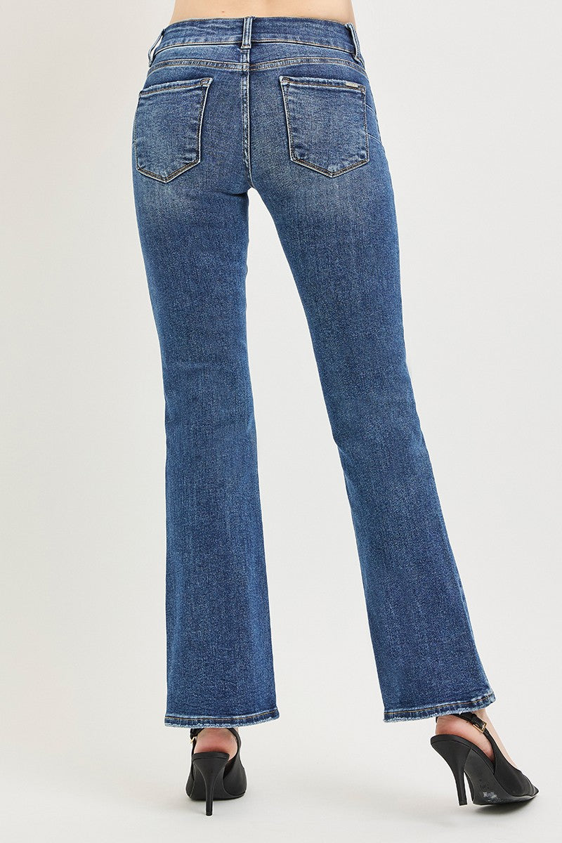 Medium wash low rise bootcut jeans, back view with two back pockets and belt loops