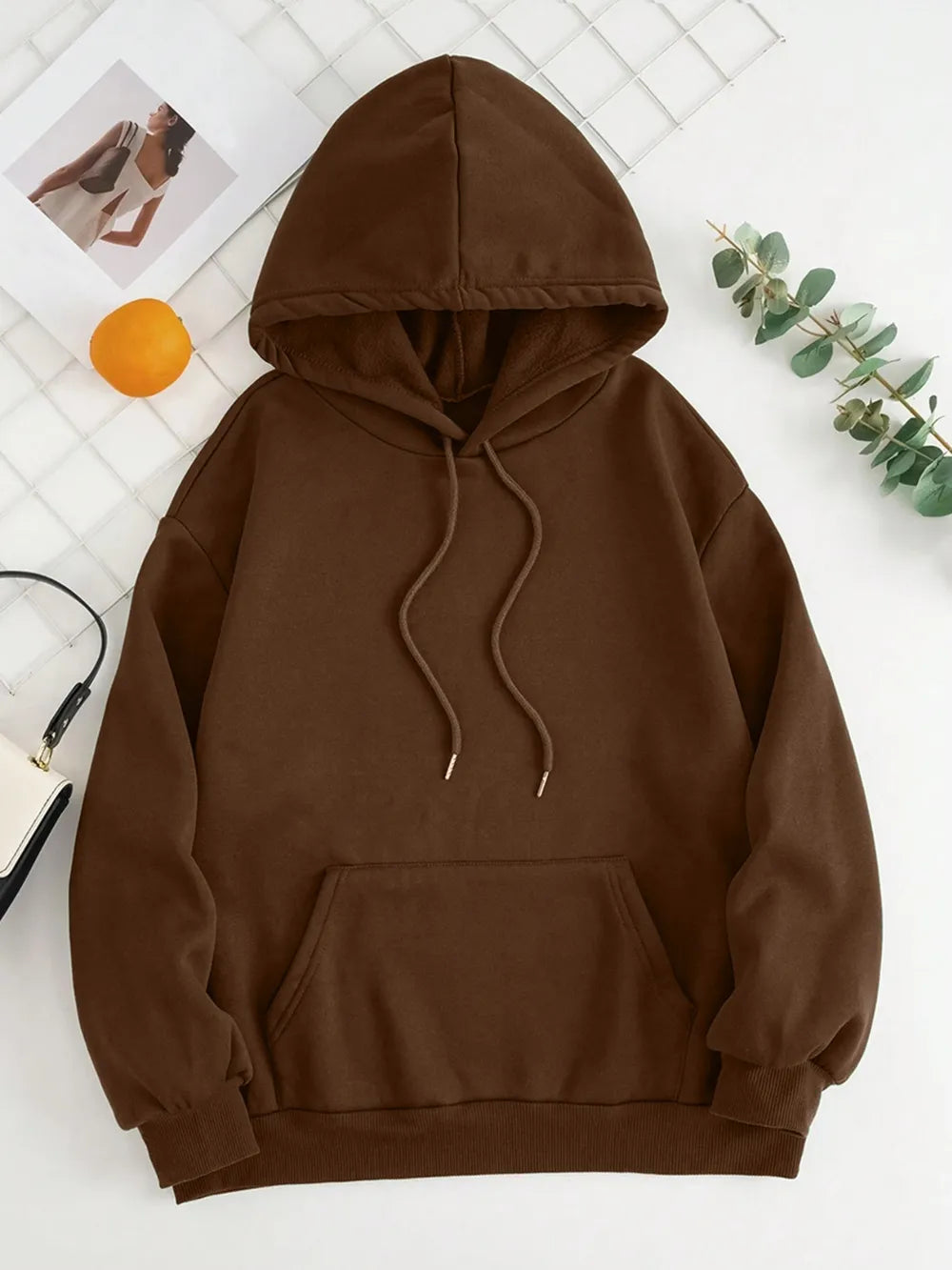 Chocolate brown drawstring dropped-shoulder hoodie with kangaroo pocket and hood.
