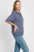 Blue indigo polo collar short-sleeve pullover with dropped shoulder and straight hem
