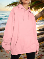 Blush pink drawstring hoodie with dropped shoulders and kangaroo pocket