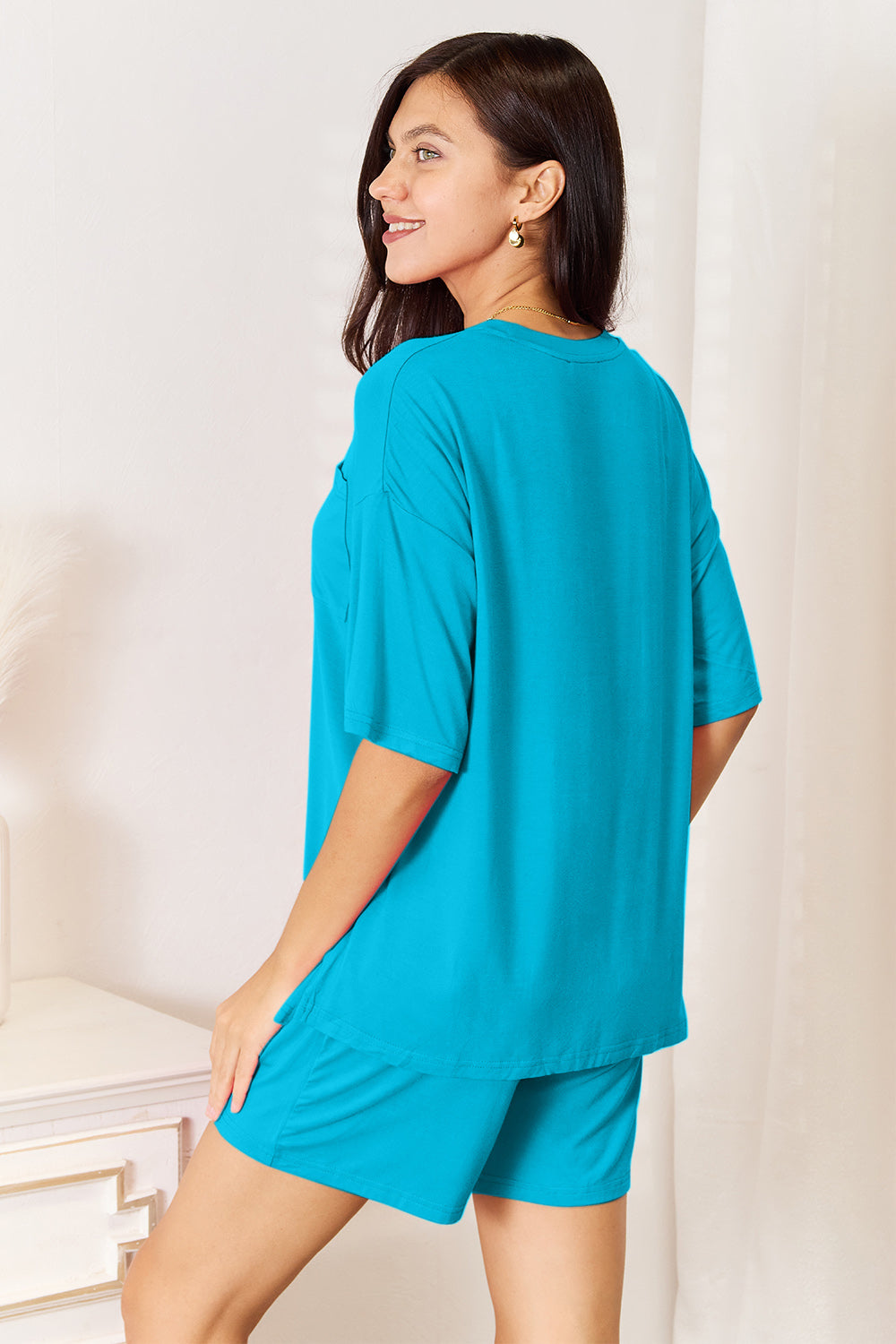 Sky blue half-sleeve top and matching shorts set, back view with relaxed fit