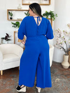 Surplice Wide Leg Jumpsuit with Pockets – Flattering, Chic & Comfy