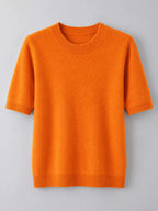 Bright orange round-neck short-sleeve sweater with ribbed hem and cuffs