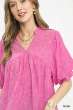Pink blouse with lace-trim V neckline and gathered yoke, short puff sleeve