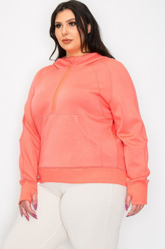 Coral hooded quarter-zip hoodie with kangaroo pocket and long sleeves