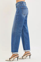Blue denim jeans with back pocket seam detail and cuffed ankle hem