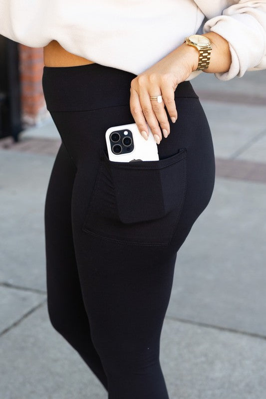 Black high-waist full-length leggings with side pocket and phone in pocket