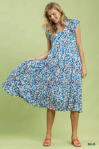 Blue tropical print tiered midi dress with V-neck and flowing tiered skirt