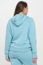 Light blue hooded quarter-zip hoodie, back view with relaxed fit