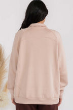 Blush apricot funnel-neck zip jacket back view with patch pockets and raglan sleeves