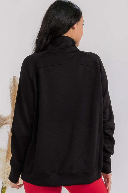 Black oversized zip-up jacket from the back with funnel neck and patch pockets