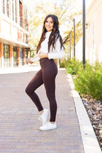 Brown full-length crossover yoga leggings with side pocket details