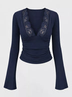Navy lace-trim V-neck long-sleeve tee with scalloped lace neckline, front view