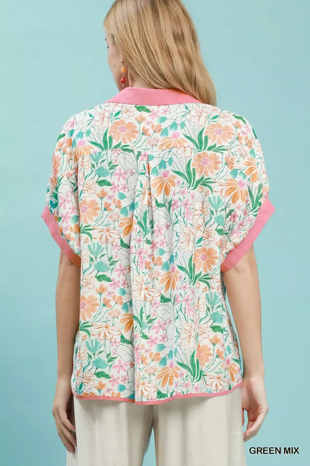Floral oversized blouse back view with short sleeves and pink trim