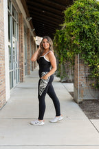 Black leggings with zebra-print side panels and ankle-length slim fit