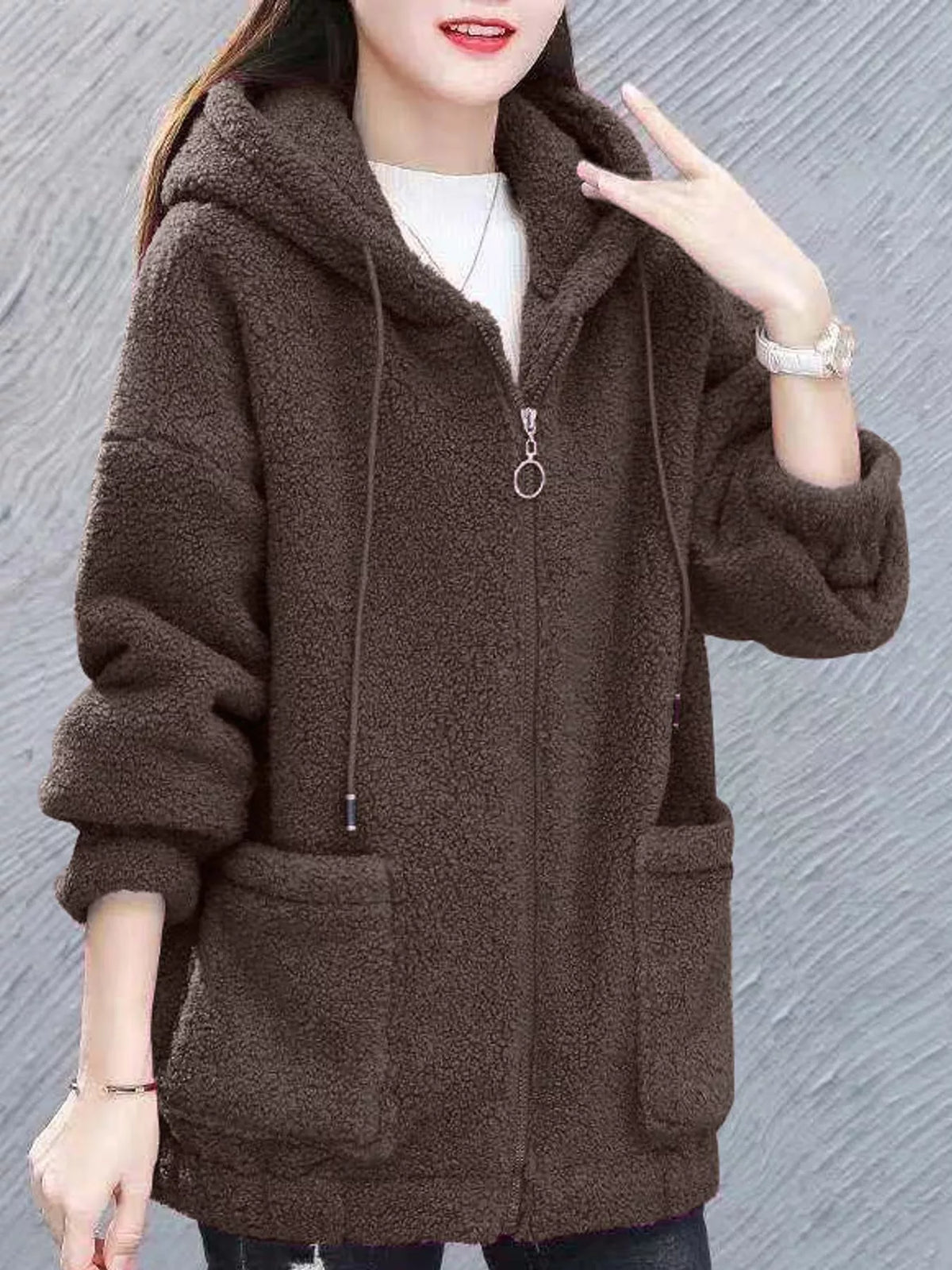 Coffee-brown fleece zip-up hoodie with hood, front zipper, and two side pockets