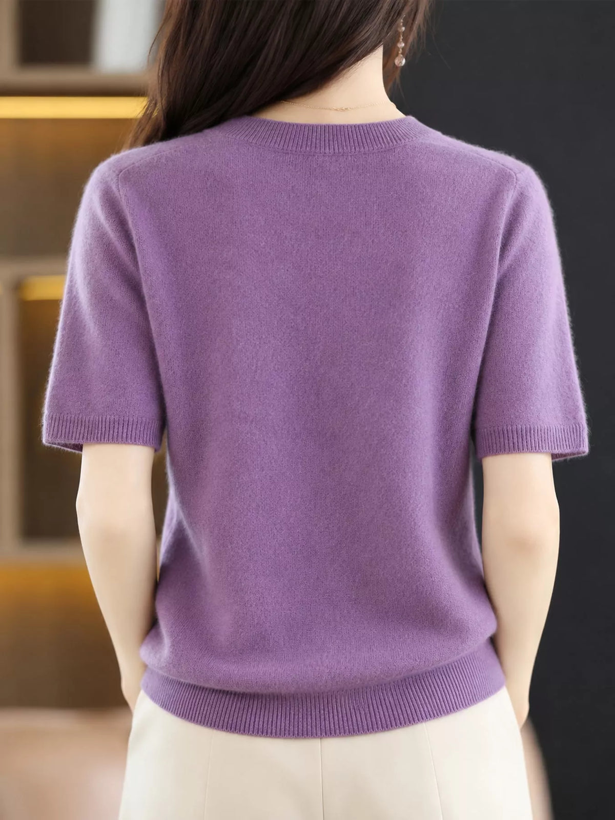 Lavender round-neck short-sleeve sweater, back view with ribbed hem and cuffs